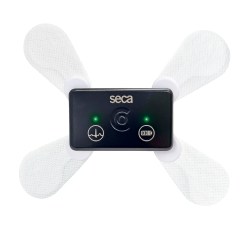 Image of the seca guard Holter ECG device, a compact black unit with adhesive electrodes for continuous heart monitoring, featuring two indicator lights and control buttons.